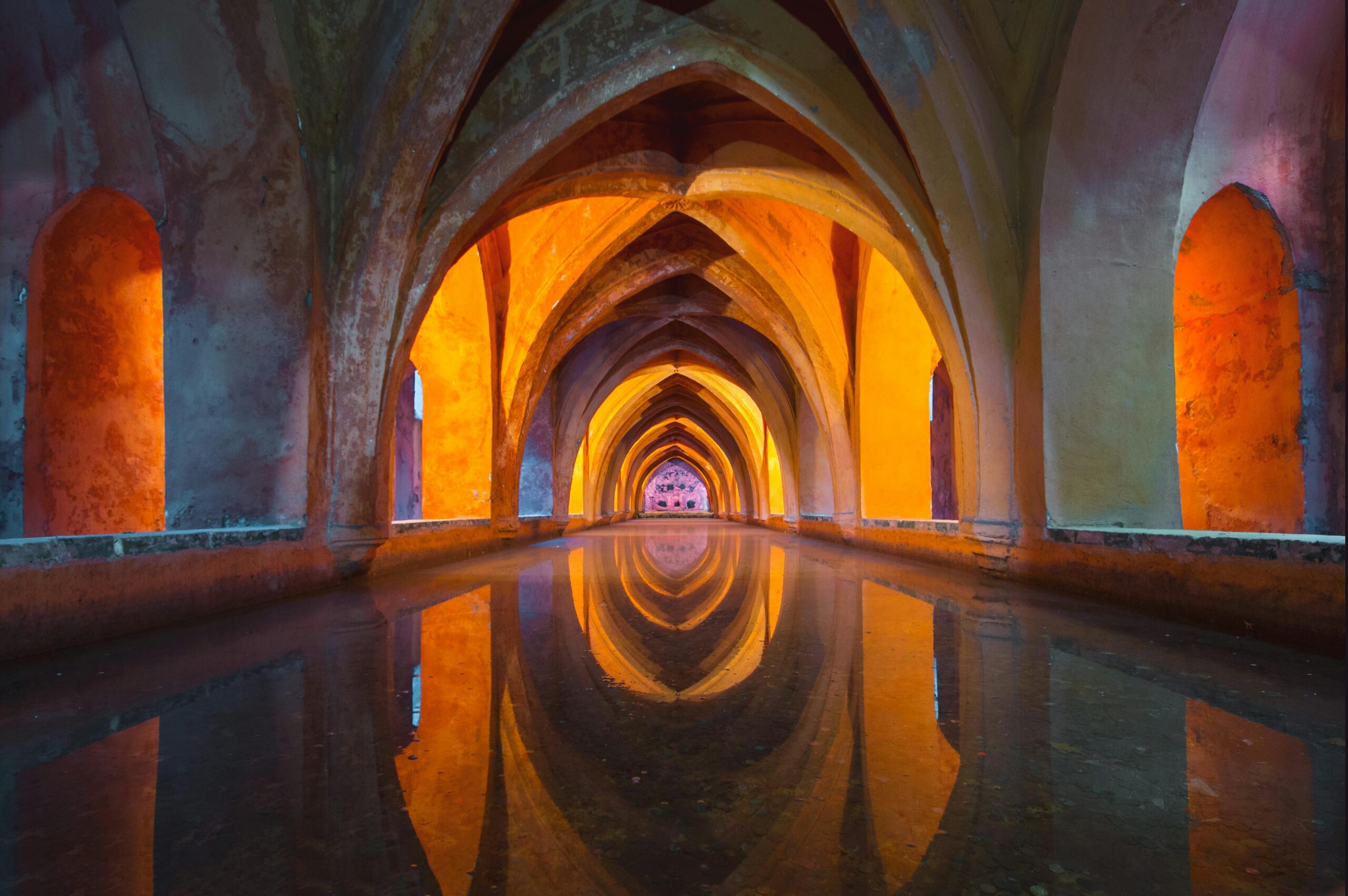 Beautiful Gothic arches reflecting in water, vibrant colors create a mesmerizing effect.